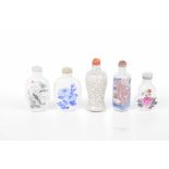 A small group of 19th Century and later Chinese porcelain snuff bottles To include a grey crackle
