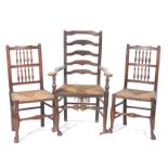 Three 18th and 19th Century rush seat chairs To include a pair of spindle back chairs each with an