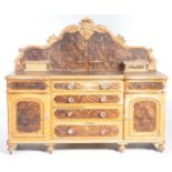 A Victorian pine and scumbled pine kitchen dresser base The raised arched back centered with a leaf
