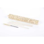 A Chinese carved bone needle case, circa 1880 The carved two section case,