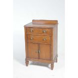 An early 20th Century oak side cabinet The rectangular top with a beaded border above two drawers