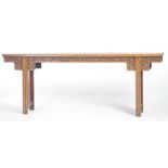 A large Chinese Huanghuali style altar table The rectangular single plank flat top,