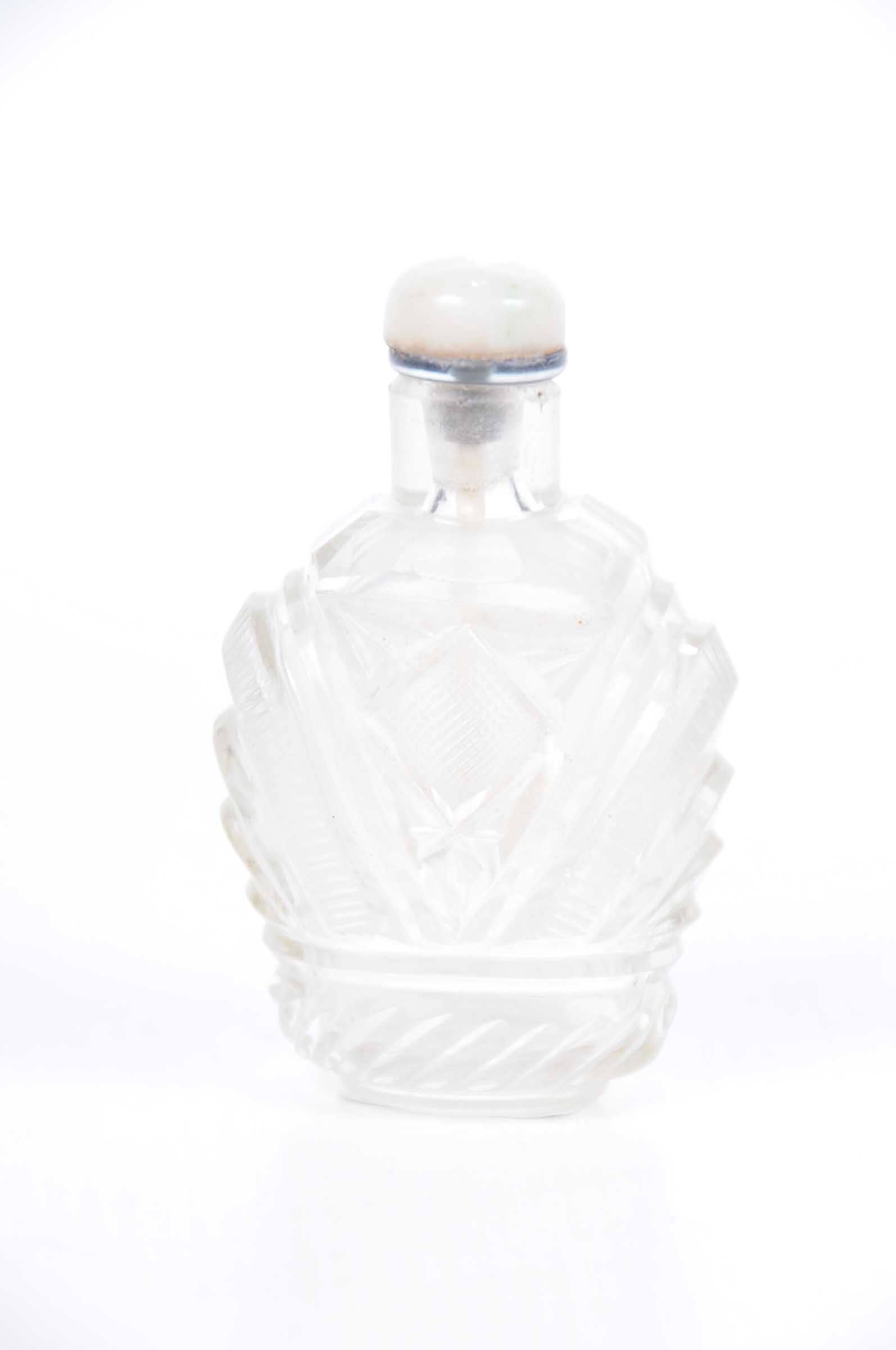 A Chinese cut glass snuff bottle,