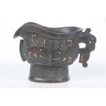 A Chinese bronze spouted wine vessel (Gong) The cast bronze vessel (used for pouring rice wine at