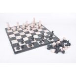 A carved stone chess set,