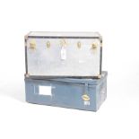 Two vintage travel trunks The first trunk with an alloy exterior,