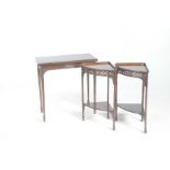 An Edwardian mahogany folding game table and a pair of mahogany freestanding corner shelves The