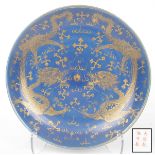 A Chinese powder blue charger, Qianlong six-character mark, 19th/20th Century Of rounded form,