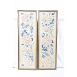 A pair of late 19th/early 20th century Chinese embroidered sleeve panels Each of the ivory