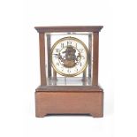 An 'Eureka' electric clock, early 20th Century 10cm white enamel dial, Arabic numerals,