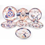 A collection of Japanese Imari dishes, 19th/20th Century Comprising seven examples,