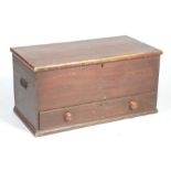 A Victorian stained pine blanket chest The rectangular hinged top enclosing a fitted candle box