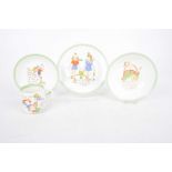 Four Peggy Gibbons Midwinter items The nursery rhyme items to include a breakfast bowl, side plate,