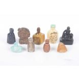 A small collection of Chinese snuff bottles and carved items To include three small carved glass