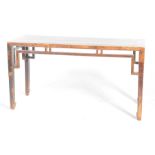 A Chinese Hunghuali style altar table The single plank top supported by slightly tapered yoke