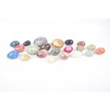 A collection of decorative carved hardstone eggs Including approximately twenty one examples of