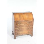 A reproduction Georgian style mahogany bureau,