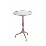 A Georgian style mahogany tray top tripod table The circular top supported on a slender ring turned