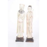 Two Chinese carved ivory figures, circa 1880 Each of the elongated figure, draped in flowing robes,