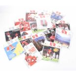 A collection of 'United Review' football magazines Comprising approximately fifty two copies,