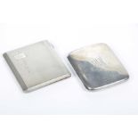 Two silver cigarette cases One of rounded form, centred with initials,