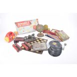 A collection of assorted toys and games To include a metal painted globe, postal scales,