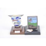 Two silver plated and enamel racing car mascots,
