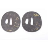 Two Japanese Edo period Tsuba (sword guards) Each of the ironwork panels,