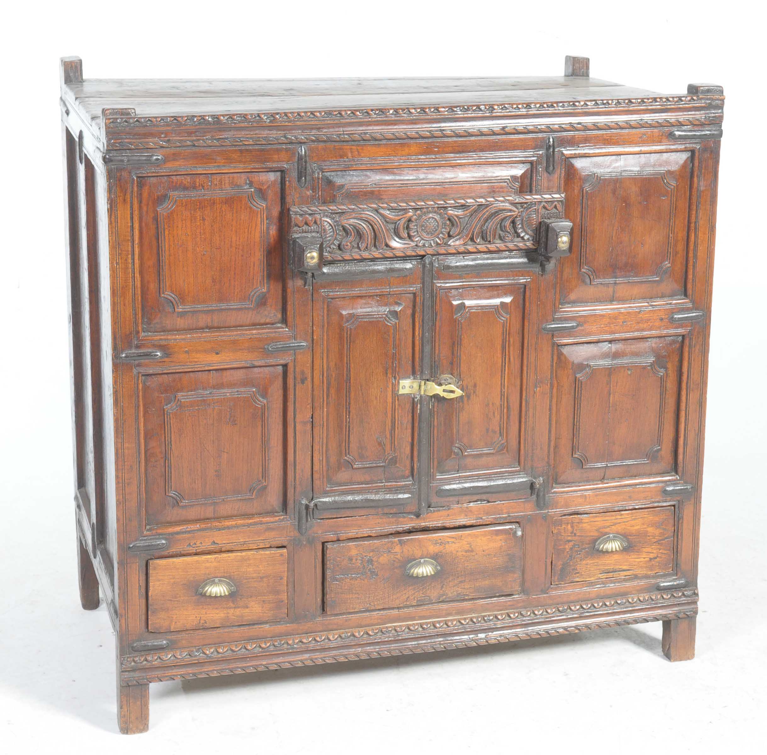 A Burmese/Tibetan wooden Dowry chest The carved and stained hardwood chest,