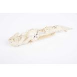 A beautiful Japanese ivory shibayama bear and tiger carving well modelled depicting a bear and