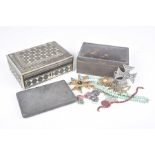 A white metal Indian made cigarette case,