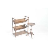 An early 20th Century two tier oak book trough and a wine table The freestanding book trough with