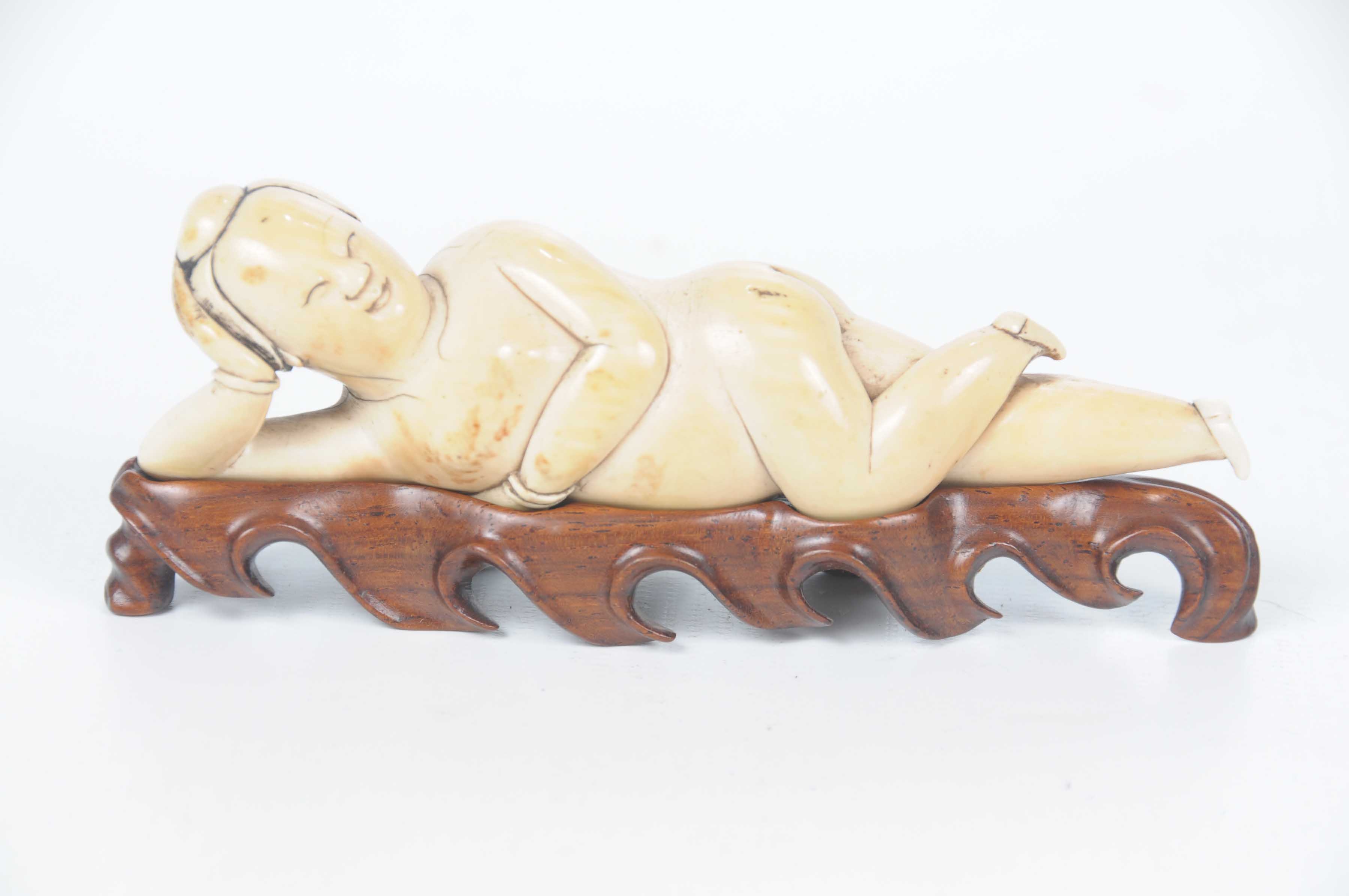 A Chinese carved ivory medicine figure,