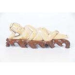 A Chinese carved ivory medicine figure,