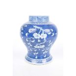A Chinese blue and white 'Prunus' jar, with Kangxi (1654-1722) character marks,
