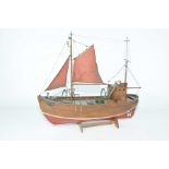 A scratch built wooden model of a trawler, 'The Gina.