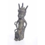 An African Benin bronze figure The figure cast as a tribe chief,