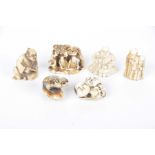 A collection of six Japanese carved ivory netsuke To include a figure of Buddha, an actors mask,