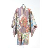 A Chinese embroidered robe, circa 1920 The mid-length robe,