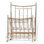 A Victorian brass single bed The square section tubular frame with button shaped finials,