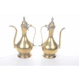 A pair of Indian Cairo ware style ewers The vessels of pear form, rising from a splayed base,