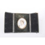 An early 20th Century gilt framed miniature The oval miniature depicting a portrait head and