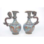 A fine pair of Chinese cloisonne ewers, incised Qianlong six - character,