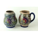 Two pieces of Crown Ducal Charlotte Rhead Comprising jug, height 15cm, vase 15.