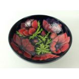 A large modern Moorcroft bowl of circular form Decorated in the 'Anemone' pattern,