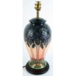 A large modern Moorcroft table lamp Of tapering cylindrical form, decorated in the 'Cluny' pattern,