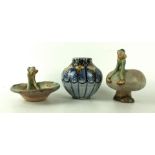 Two Borune Denby elf's seated on mushrooms Height of largest example 12cm,