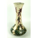 A large Cobridge stoneware vase Of trumpet form, decorated in the 'Foxglove' pattern,