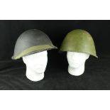 A green painted Russian Infantry helmet, mid 20th Century With leather lining,