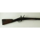 A Flintlock musket early 19th Century 104cm barrel, wooden stocked with three bands,